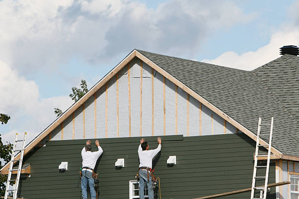 Professional Siding Installation technician working in Ashland, PA